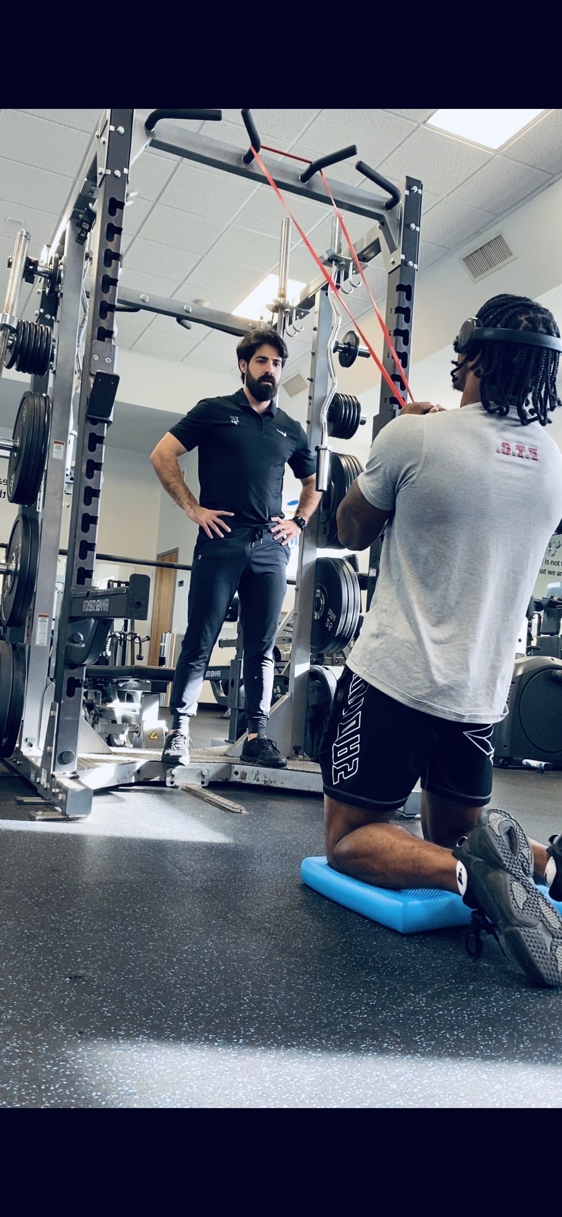 Dr. Jorge Porter-Wolf training an athlete